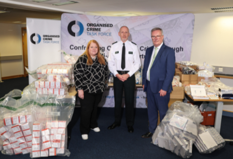 Pictured with drugs seized during the five months of action are: Justice Minister Naomi Long, ACC Davy Beck from the PSNI and Health Minister Mike Nesbitt.